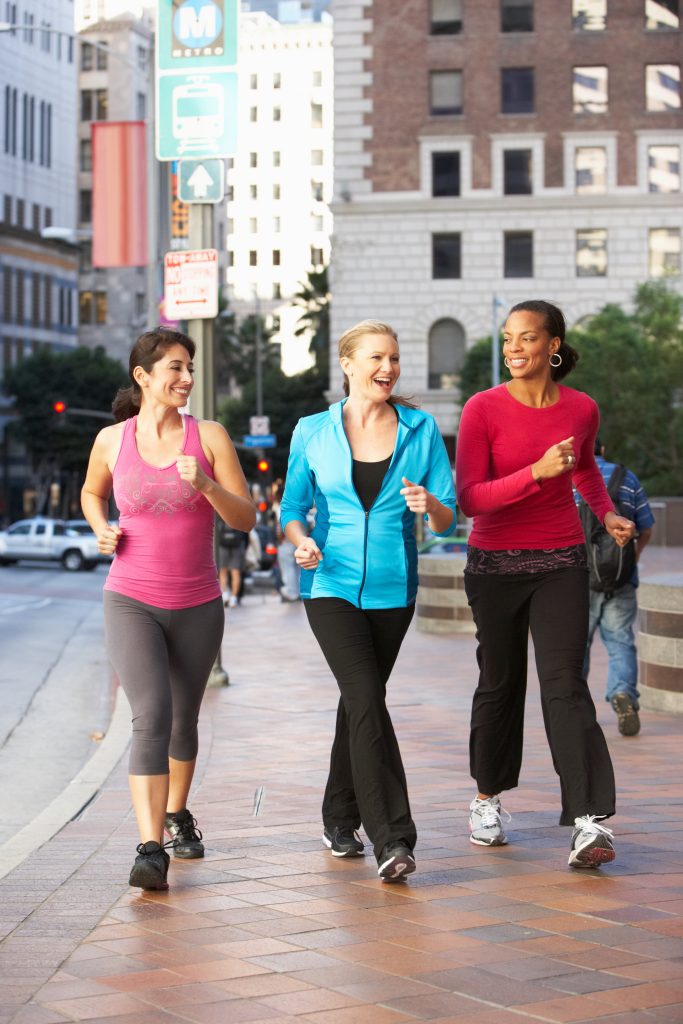 Women walking for exercise in the city